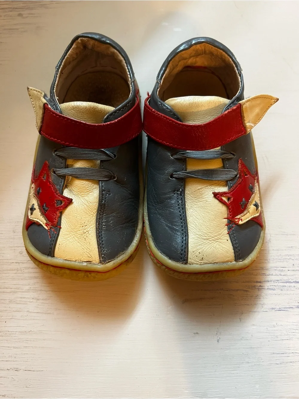 Live & Luca red and navy fox size 7